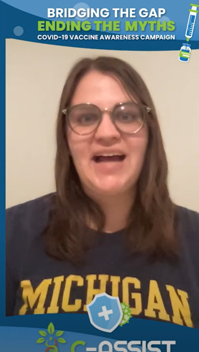 Blue frame with the header "Bridging the Gap, Ending the Myths, COVID-19 Awareness Campaign" next to a cartoon vial and syringe, and the footer "C-ASSIST". In the frame is a woman with shoulder length brown hair, glasses, and wearing a University of Michigan shirt.