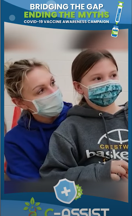 Blue frame with the header "Bridging the Gap, Ending the Myths, COVID-19 Awareness Campaign" next to a cartoon vial and syringe, and the footer "C-ASSIST". In the frame are a white mother and daughter who are both wearing masks.