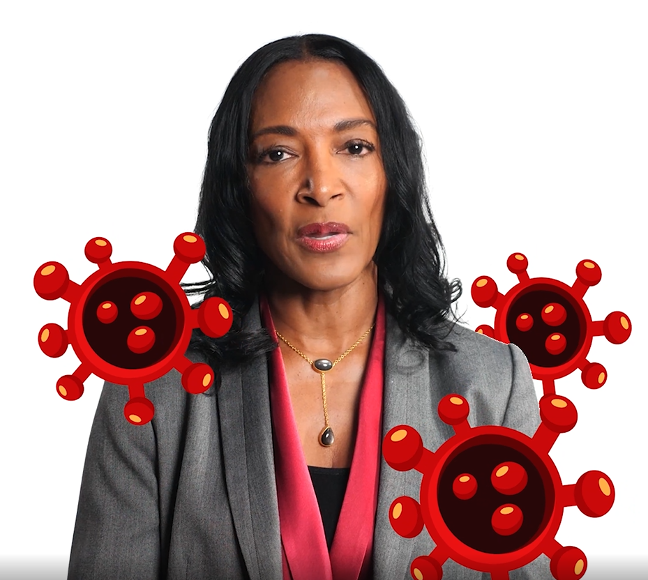 An African American Woman speaks to the audience. Animated COVID-19 viruses are picture next to her on both sides