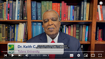 Image of Dr. Keith C. Ferdinand from the American College of Physicians seated in front of bookshelves.