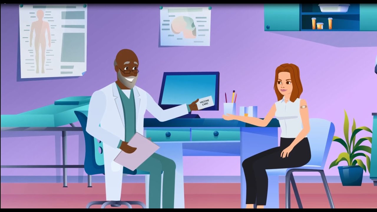 Image of an elderly Black man doctor giving a vaccine card to a white woman patient