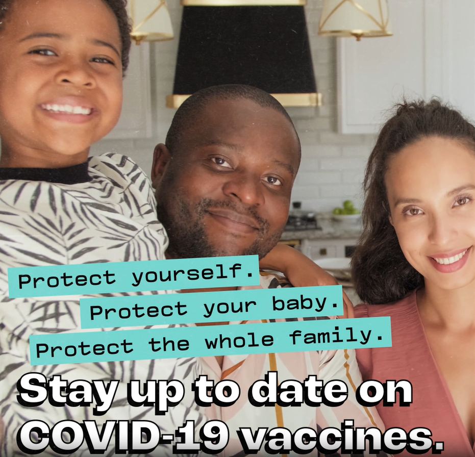 A mixed-race family of three smiles at the camera. English text reads: "Protect yourself. Protect your baby. Protect the whole family. Stay up to date on COVID-19 vaccines."