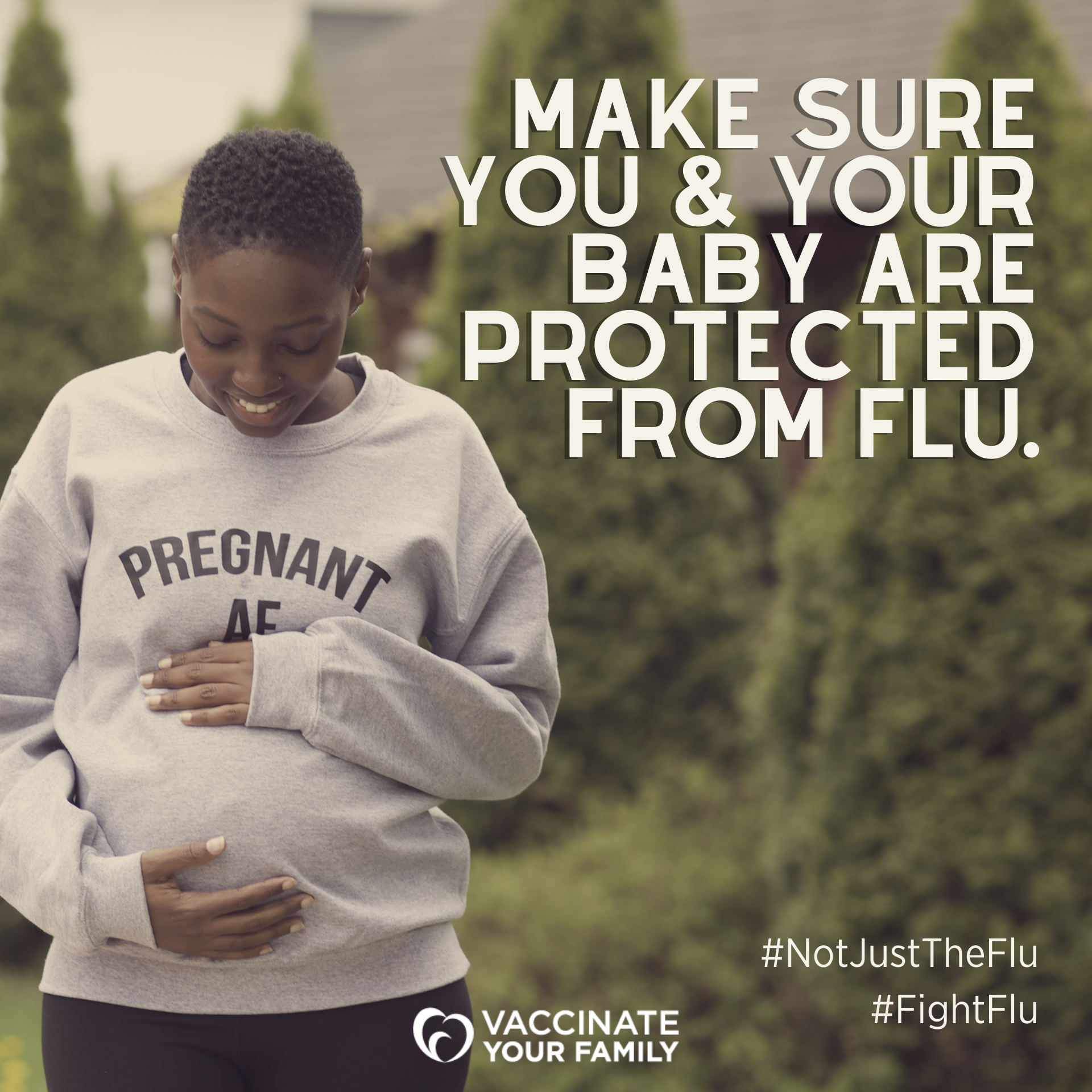 A background of blurred trees with a Black woman in a sweatshirt holding both her hands around her pregnant belly. Text is in white and Vaccinate Your Family logo and flu campaign hashtags are at the bottom.