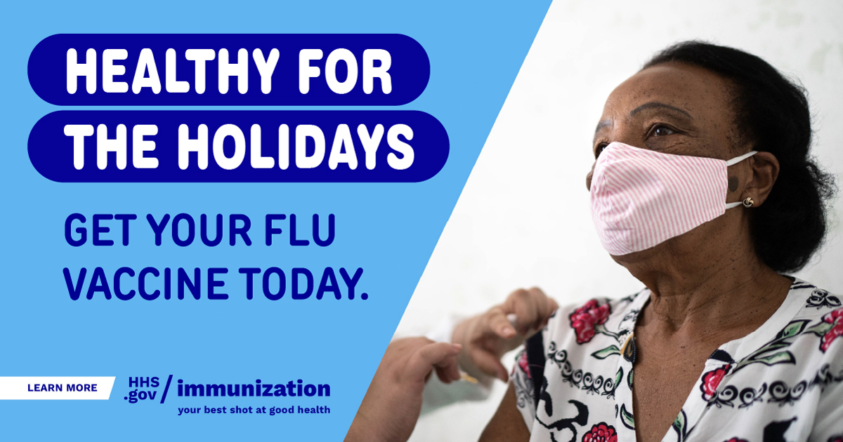 An older Black woman wears a mask and is getting vaccinated. Text reads, "Healthy for the holidays. Get your flu vaccine today."