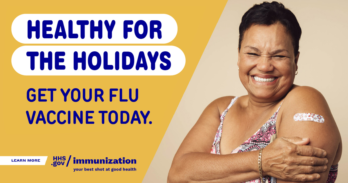 An woman smiles and shows an adhesive bandage on her arm. Text reads, "Healthy for the holidays. Get your flu vaccine today."