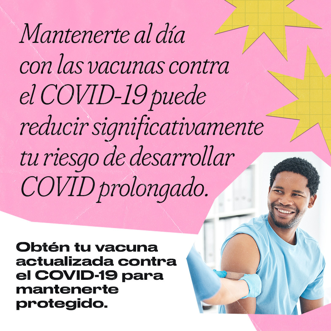 A Black man smiles as a healthcare worker puts an adhesive bandage on his arm. Spanish text reads, "Staying up to date on COVID-19 vaccines dramatically reduces your risk of developing long COVID. Get your updated COVID-19 vaccine to stay protected."