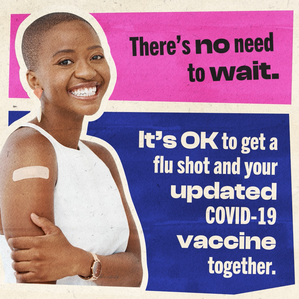 Video displays a person of color smiling broadly with a band aid on their arm.