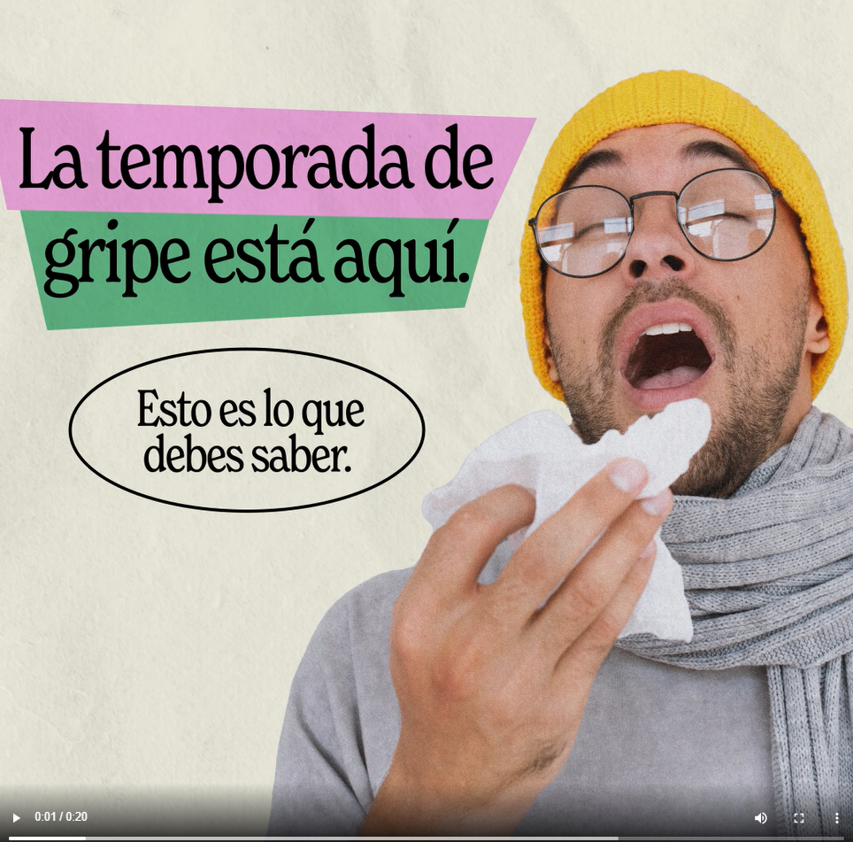 A man sneezes into a tissue. Spanish text reads, "Flu season is here. Here's what you need to know."