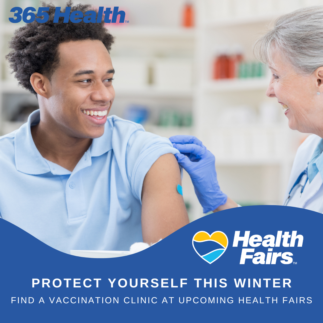 Black male smiling while getting ready to get his vaccine.  365 Health logo in the top left corner.  Health Fairs logo in the bottom right corner.
