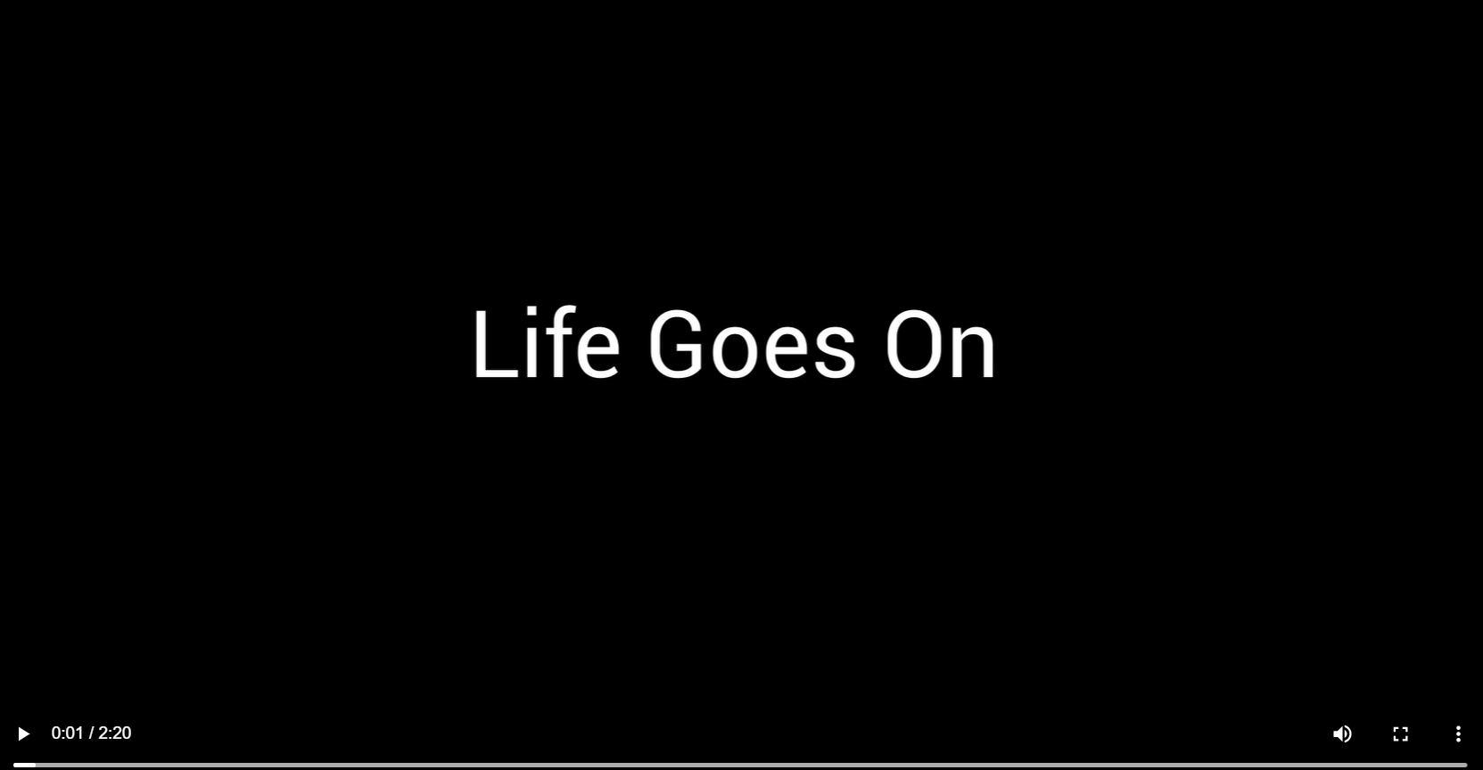 The words "life goes on" appear in white against a solid black background. 
