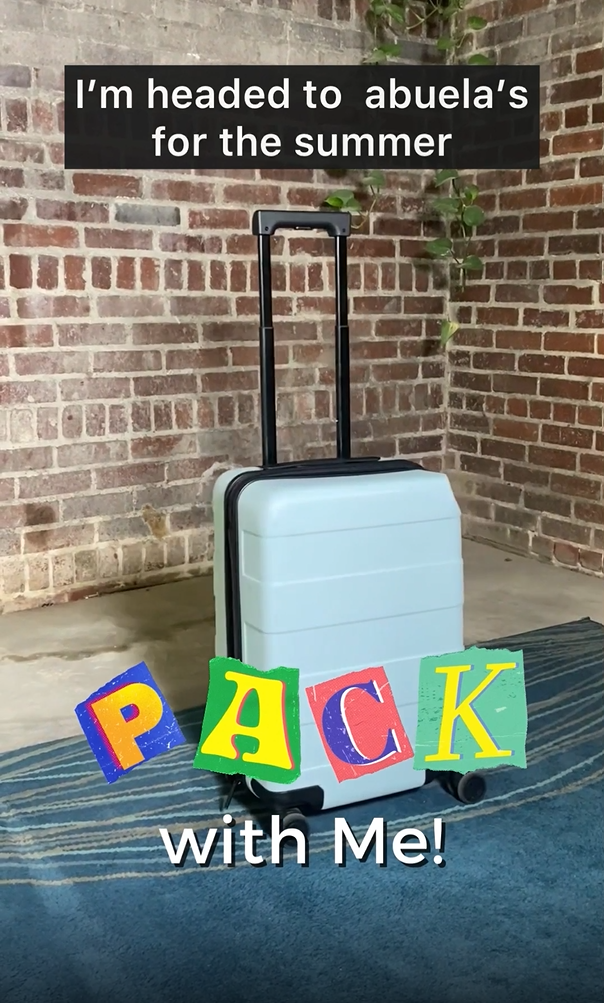 A blue suitcase underneath a title reading, "Pack with Me!" Caption reads "I'm heading to Abuela's for the summer."