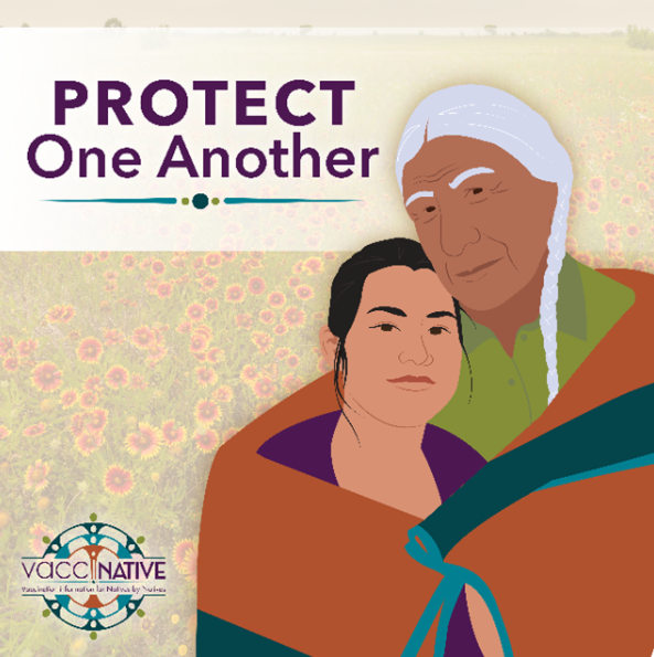 An older Native man embraces a younger Native woman under a quilt.