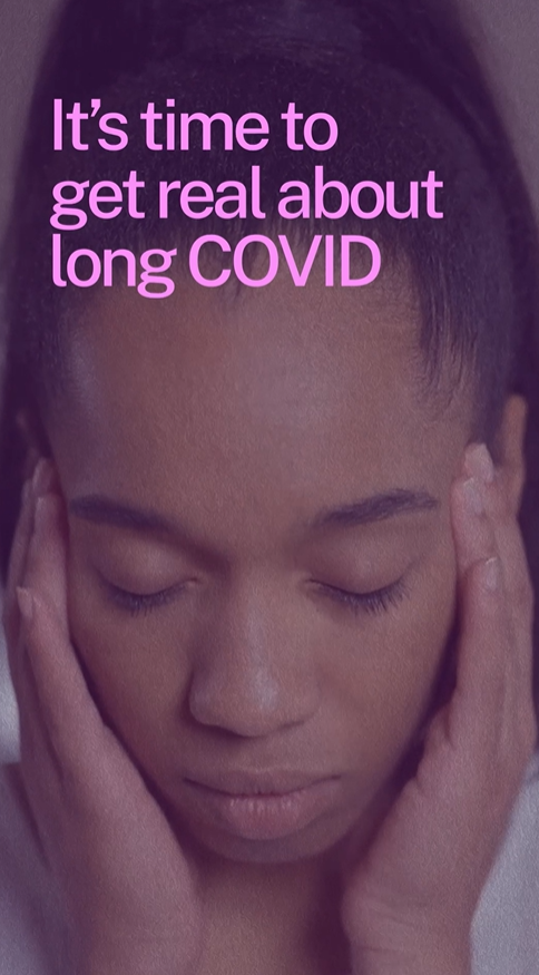 Video still shows a close up of a young Black woman with her eyes closed, massaging her temples.