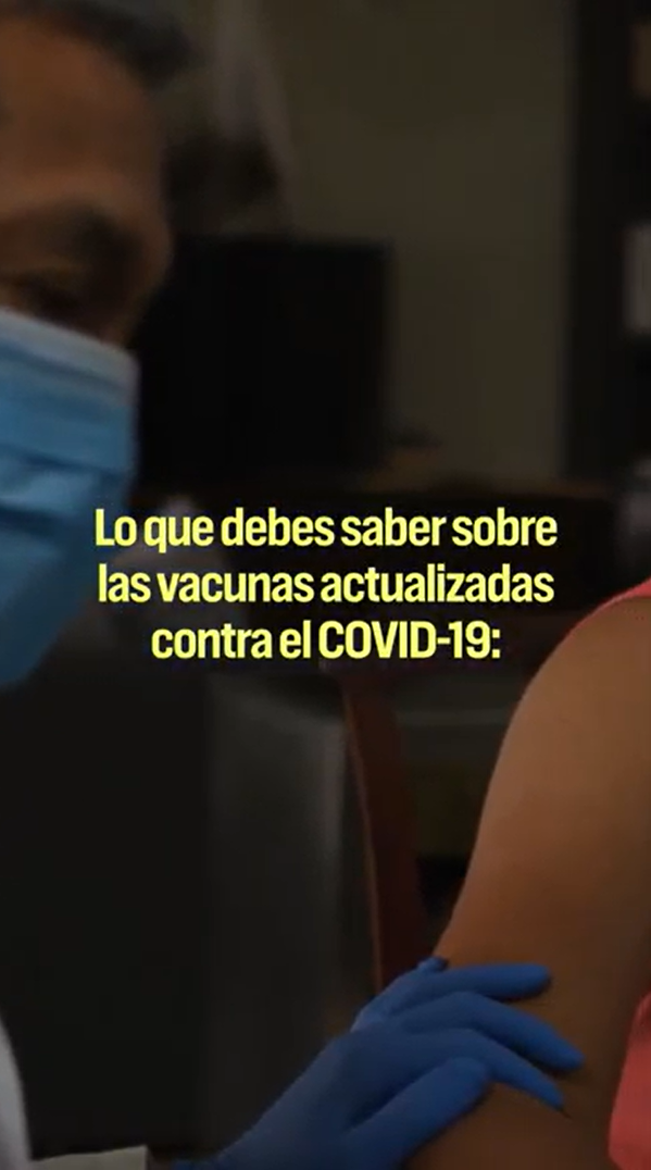 Video still shows text over the image of a woman's arm about to receive a vaccine by a health care provider in a mask and blue gloves.