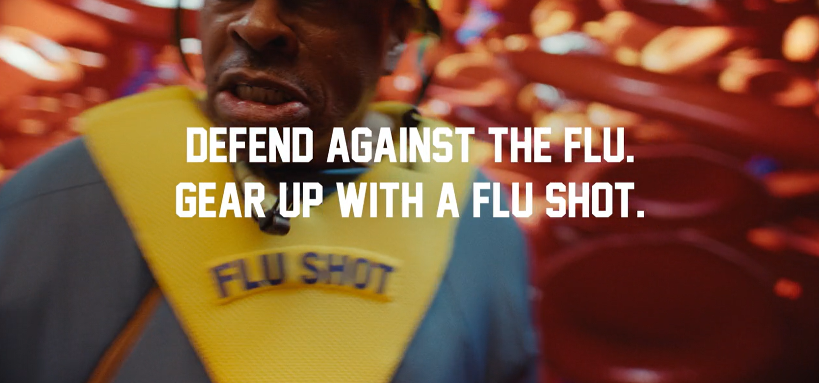 Video still reads "defend against the flu, gear up with a flu shot.'