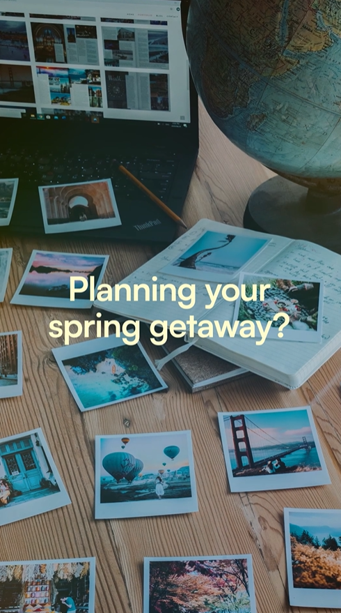 Video still shows a series of printed photographs from around the world on a desk beside a globe.