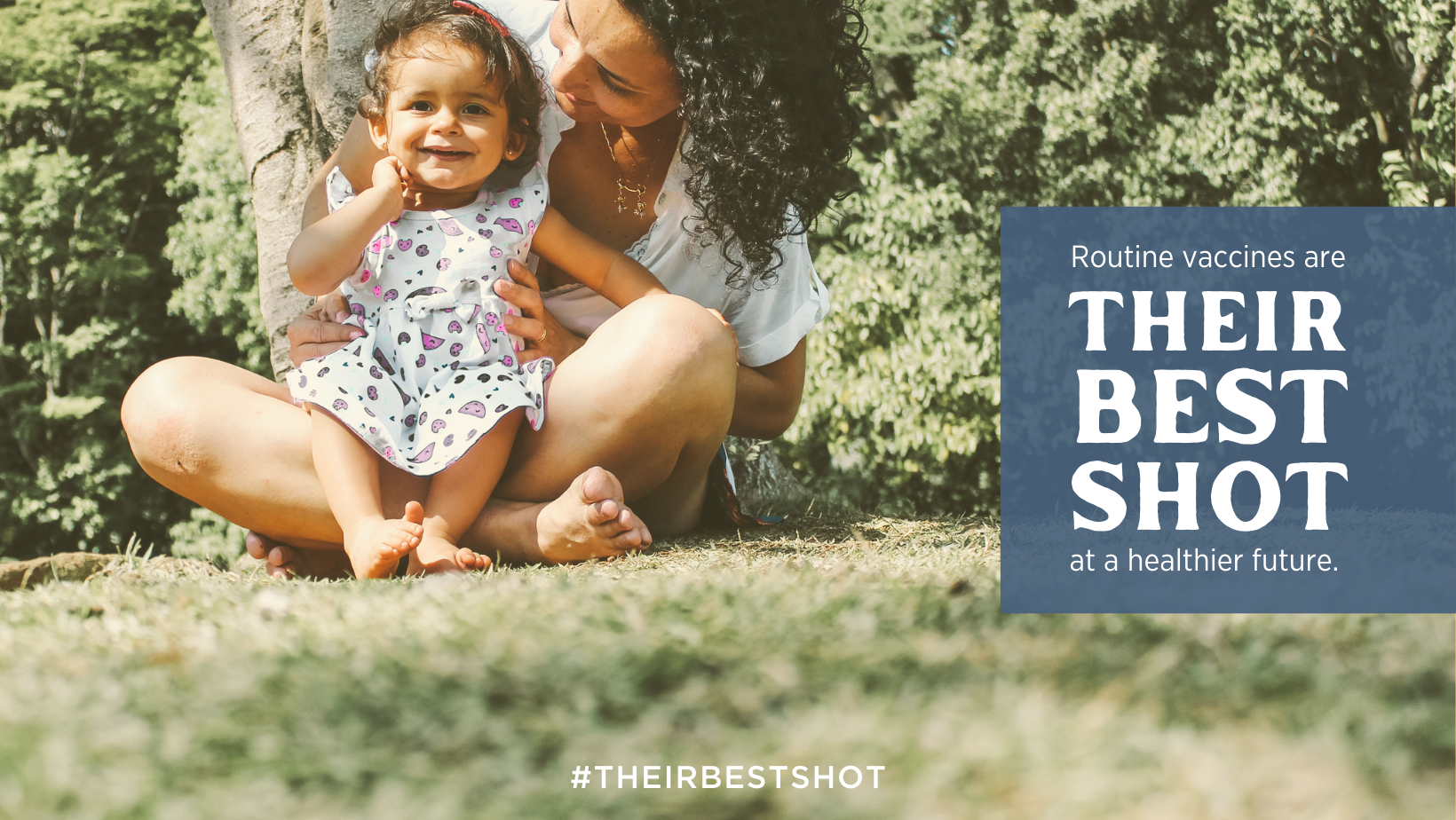 A mother holds her young child outdoors. Text reads, "routine vaccinations are their best shot for a healthier future."