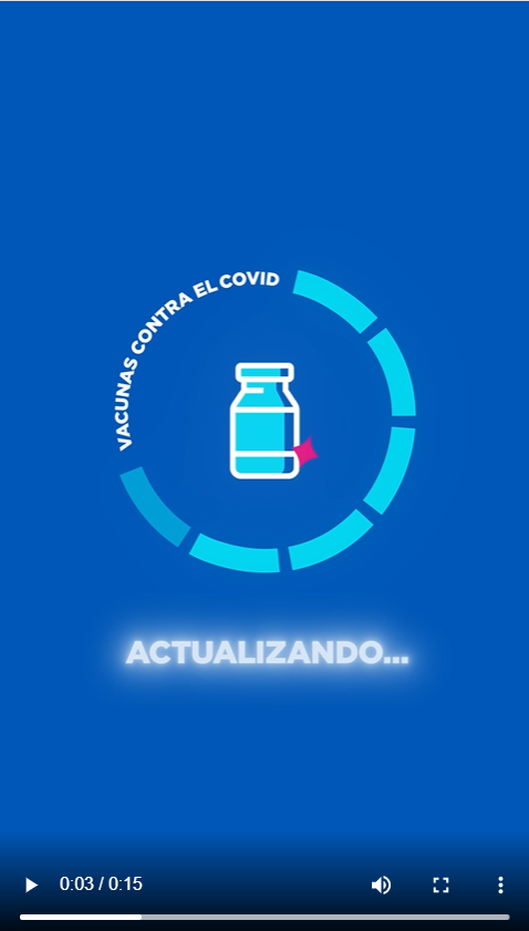 Graphic of a COVID-19 vaccine vial inside a loading circle image. Spanish text reads, "Updating..."