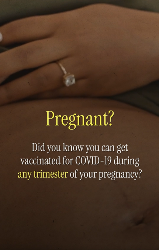 Close-up of a Black pregnant woman placing a hand on her stomach. Text reads, "Pregnant? Did you know you can get vaccinated for COVID-19 during any trimester of your pregnancy?"