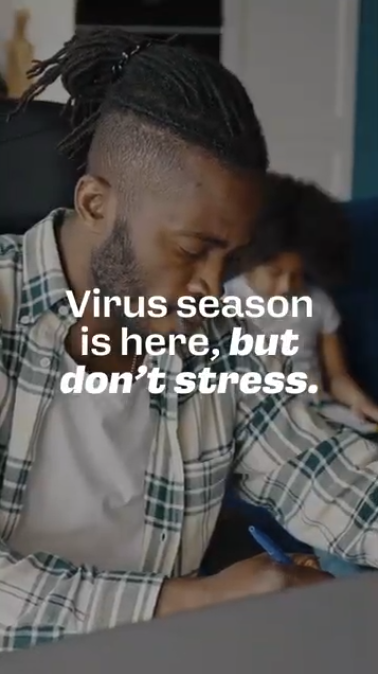 There's still time to get your family's flu and COVID-19 vaccines Video rotates through clips of parents working, cooking, ironing clothes, and grocery shopping. Text reads: “Virus season is here, but don’t stress. It’s better to get your flu and COVID-19 vaccines late than not at all.”