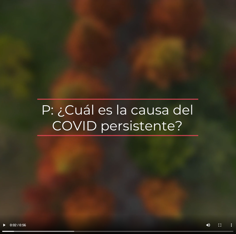 Spanish text reads, "Q: What causes long COVID?" on a blurred red and green background showing the tops of trees in fall.