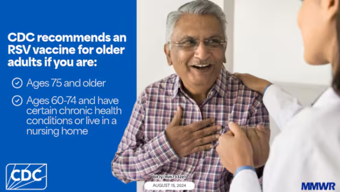 Image of an elderly, South Asian man speaking with a white woman doctor