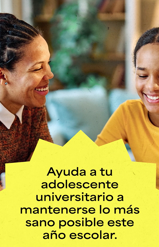 Black mother and daughter smiling at each other.